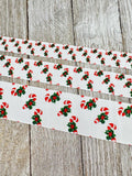 May include: Three white ribbons with a repeating pattern of red and white candy canes and green holly leaves. The ribbons vary in width, with the widest ribbon at the bottom. The candy canes have red stripes and are paired with green holly and red berries, creating a festive Christmas theme.